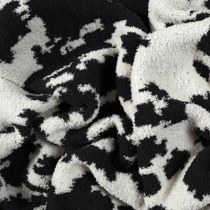 Wrangler Black & White Cowhide Stretchy Throw Blanket